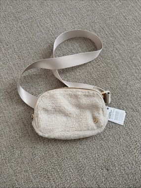 lululemon Cream Sherpa Everywhere Belt Bag with Gold Hardware